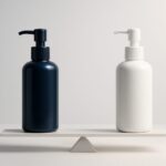Two plain hair tonic bottles placed side by side like a balanced scale, one dark blue and one white, representing a visual comparison of hair growth products